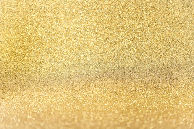Primo piano di sfondo glitter dorato