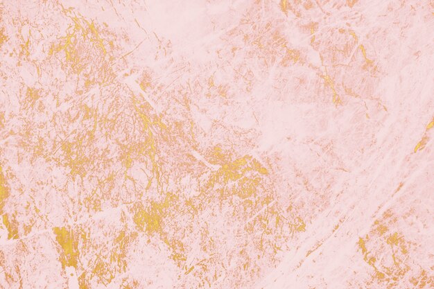 Primo piano di vernice rosa su uno sfondo di parete