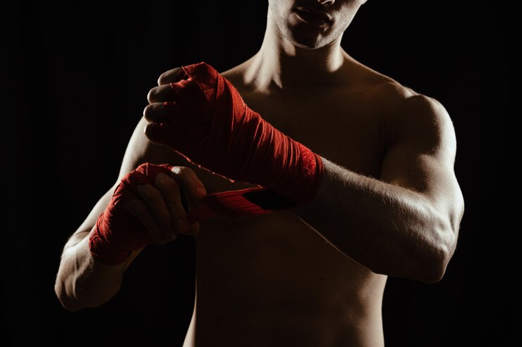 Foto gratuito primo piano mani boxer bendaggio