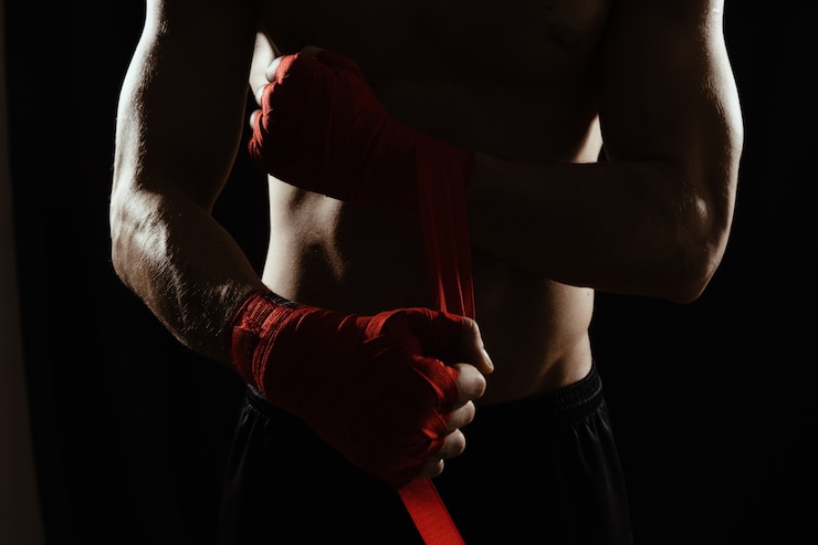 Foto gratuito primo piano mani boxer bendaggio
