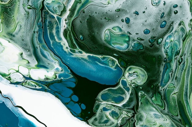 Priorità bassa di turbinio di marmo verde fai da te che scorre texture arte sperimentale