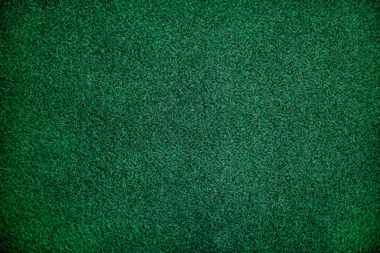 Foto gratuito priorità bassa strutturata dell'erba artificiale verde