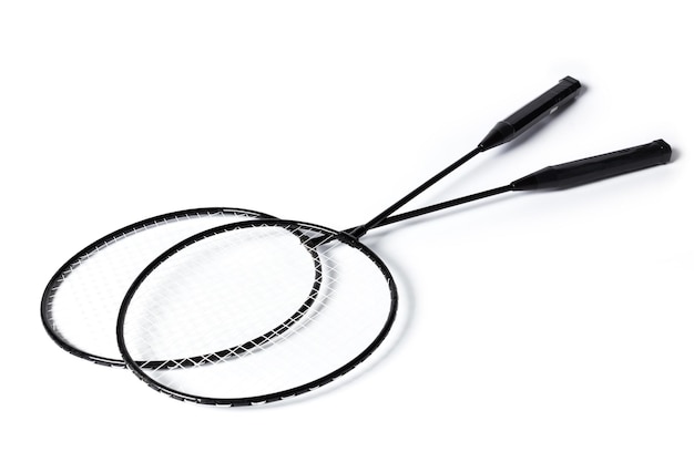 Racchette da badminton su bianco