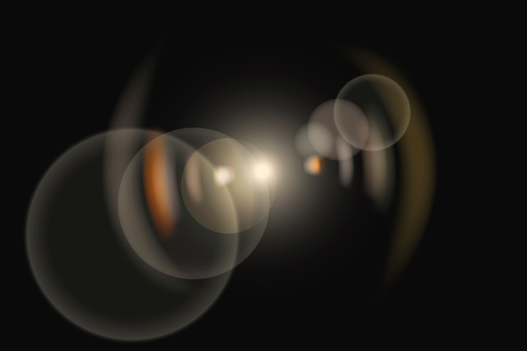 Foto gratuito riflesso dell'obiettivo giallo con effetto di illuminazione fantasma ad anello