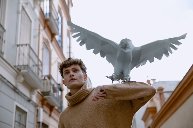 Ritratto dell'uomo con l'uccello 3d illustrato