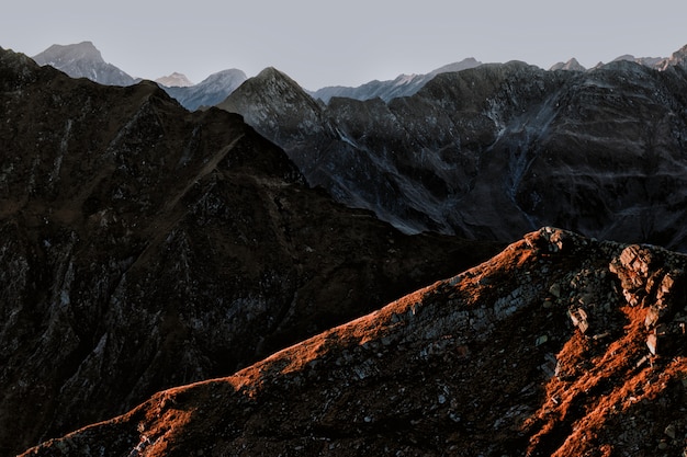 Rocky Mountain Under Grey Clouds