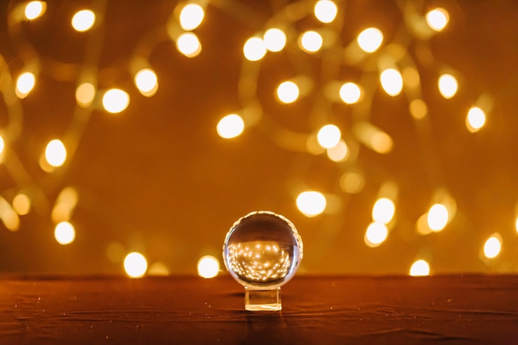 Foto gratuito sfera magica e luci fatate
