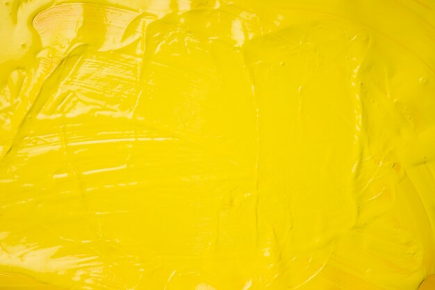 Sfondo creativo di vernice gialla