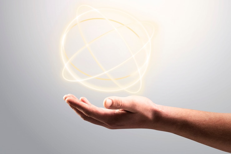 Foto gratuito sfondo dell'ologramma dell'atomo che mostra il remix della tecnologia scientifica della mano dell'uomo