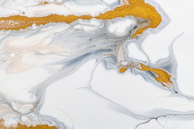 Sfondo di marmo liquido bianco e oro fai da te lusso che scorre texture sperimentale arte