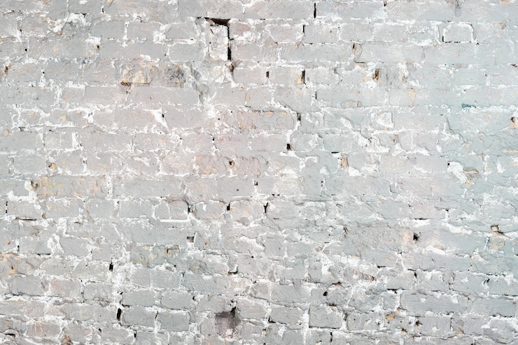 Foto gratuito sfondo grigio muro di mattoni