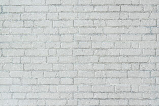 Sfondo muro di mattoni bianchi in camera