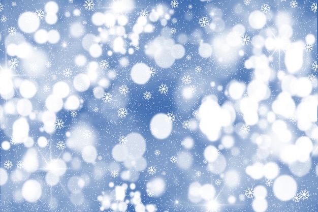 Sfondo Natale con i fiocchi di neve e luci bokeh