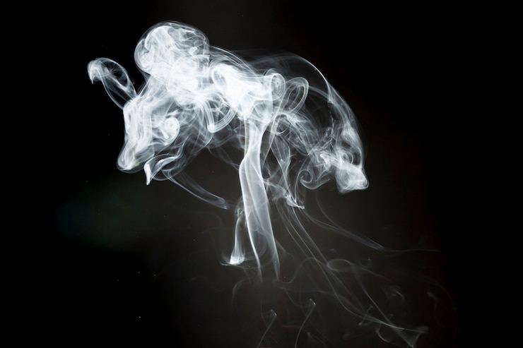 Foto gratuito sfondo nero con silhouette di fumo