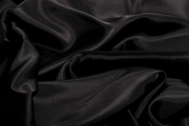 Sfondo nero trama del tessuto di seta