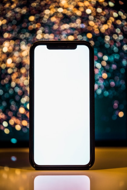 Smartphone su sfondo Bokeh