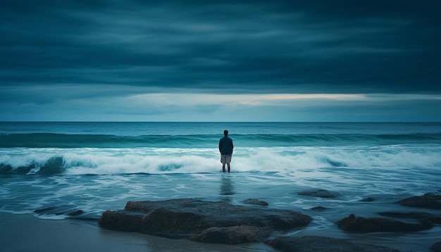 Solitudine sulla costa una persona in piedi generata dall'IA