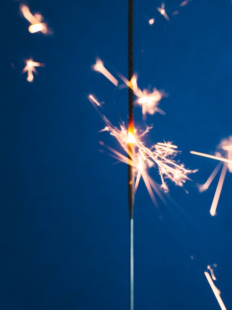 Sparkler stick on blue