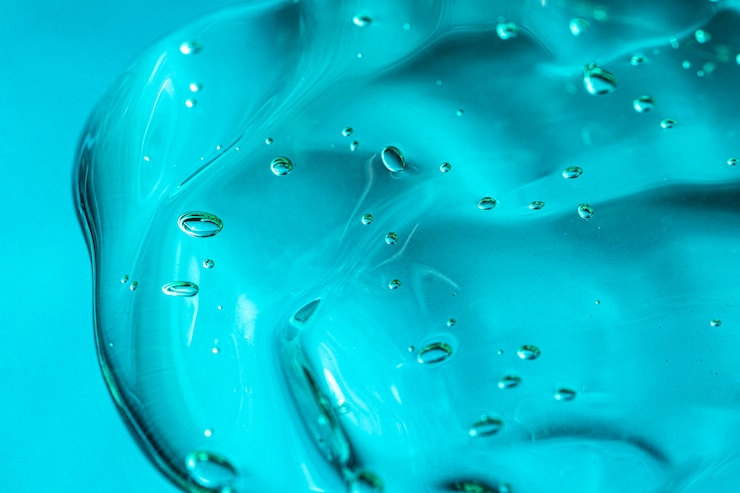 Foto gratuito spazio blu della copia del disinfettante per le mani