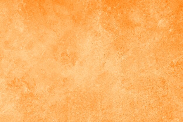 Struttura astratta arancione-chiaro o gialla della parete