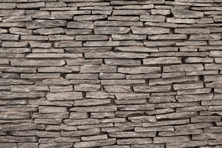 Foto gratuito struttura del muro di blocchi grigio