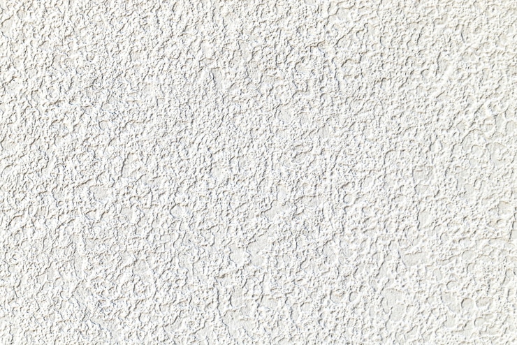Foto gratuito struttura della parete intonacata cemento bianco grezzo