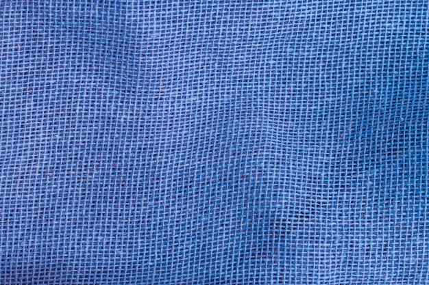 Tessuto blu di struttura del primo piano del vestito