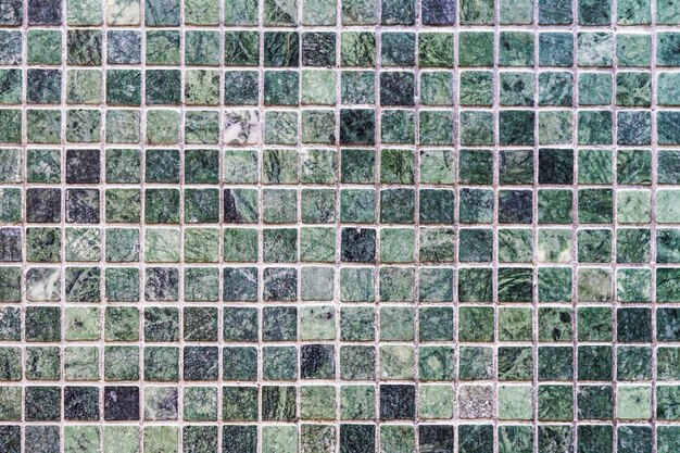 Texture e superficie della parete di piastrelle verdi
