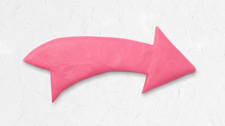 Foto gratuito trama di argilla freccia rosa che punta a destra grafica artigianale per bambini