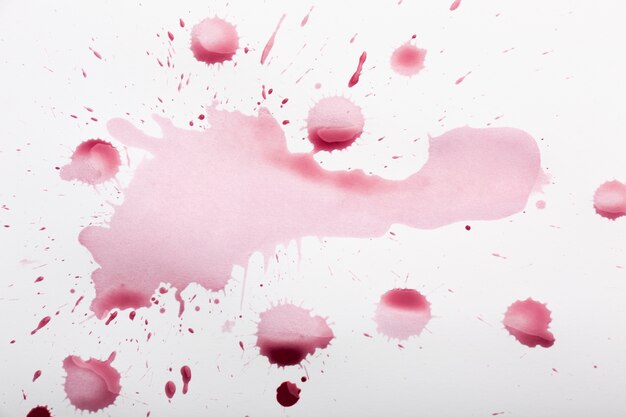 Trama di macchie di vino rosso