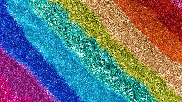 Trama di sfondo glitter arcobaleno colorato