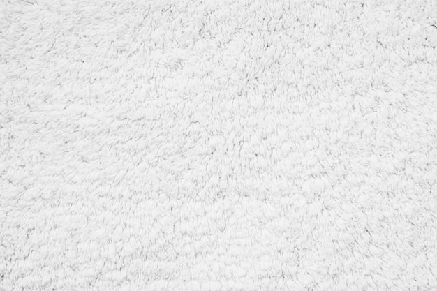 Trame e superficie del tappeto in cotone bianco