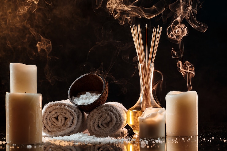 Foto gratuito trattamento spa su muro scuro