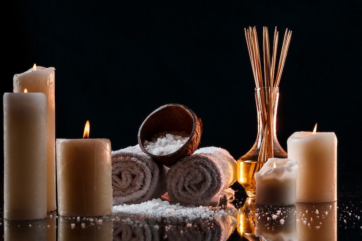Foto gratuito trattamento spa su superficie scura