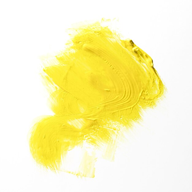 Tratto di pennello giallo con sfondo bianco