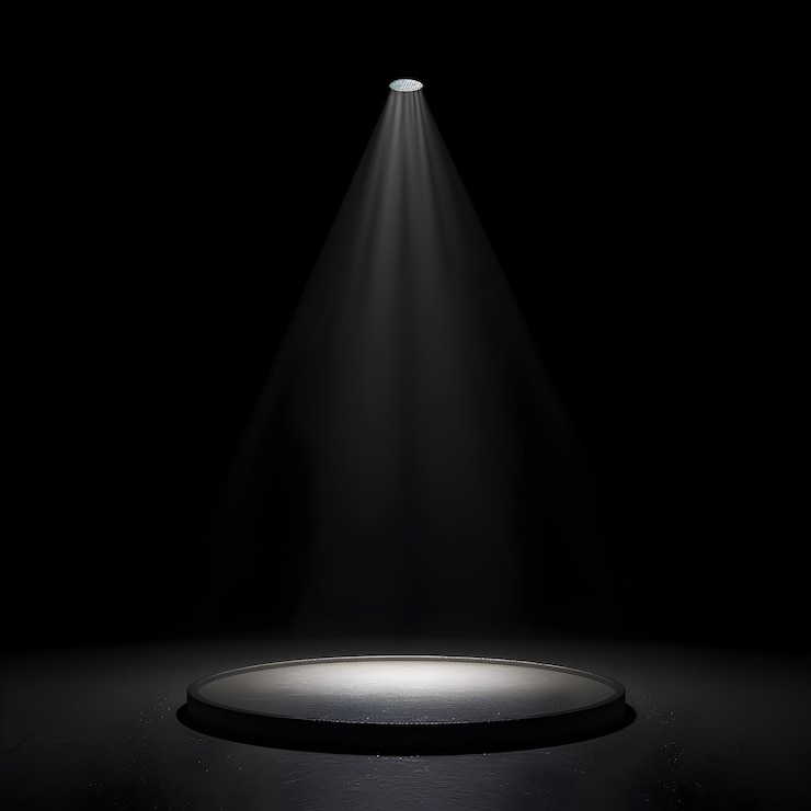 Foto gratuito un proiettore su un palco rotondo nero con una stanza buia