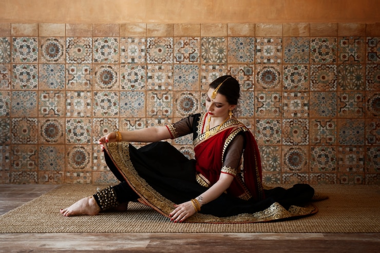 Foto gratuito una bella giovane donna che indossa un sari