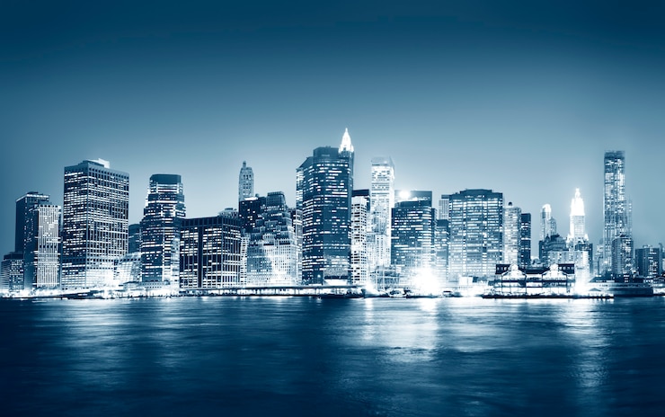 Foto gratuito una vista della città di new york durante le ore notturne