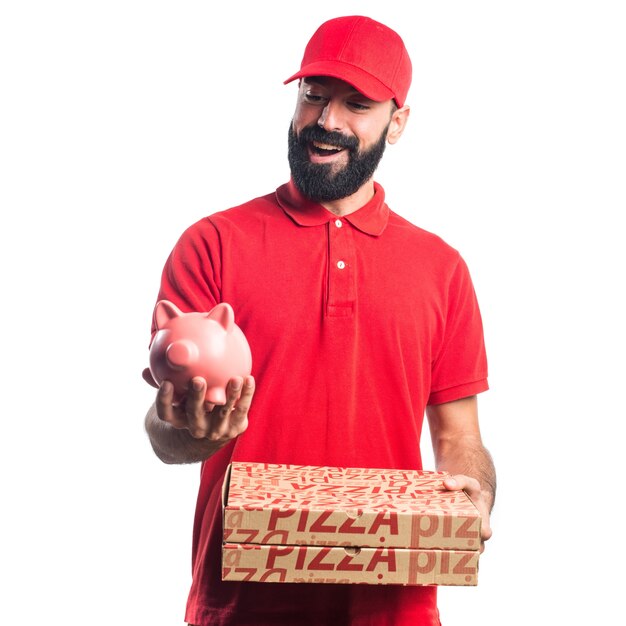 Uomo di consegna pizza in possesso di un piggybank