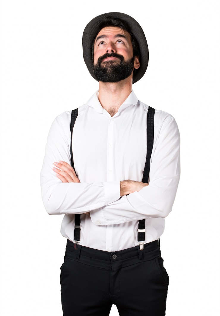 Foto gratuito uomo di hipster con la barba alzando lo sguardo
