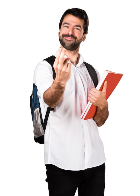 Uomo studente facendo il gesto di arrivo