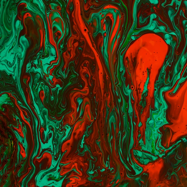 Vernice mista distesa piatta con i colori verde e rosso