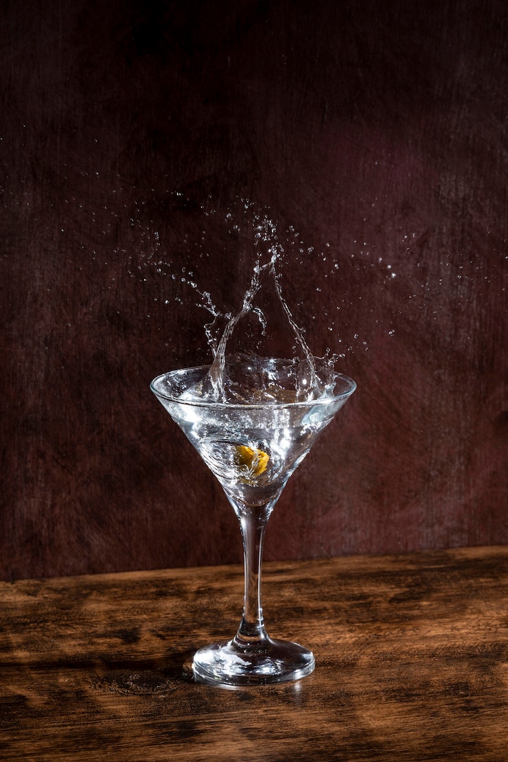 Foto gratuito vetro con champagne e oliva