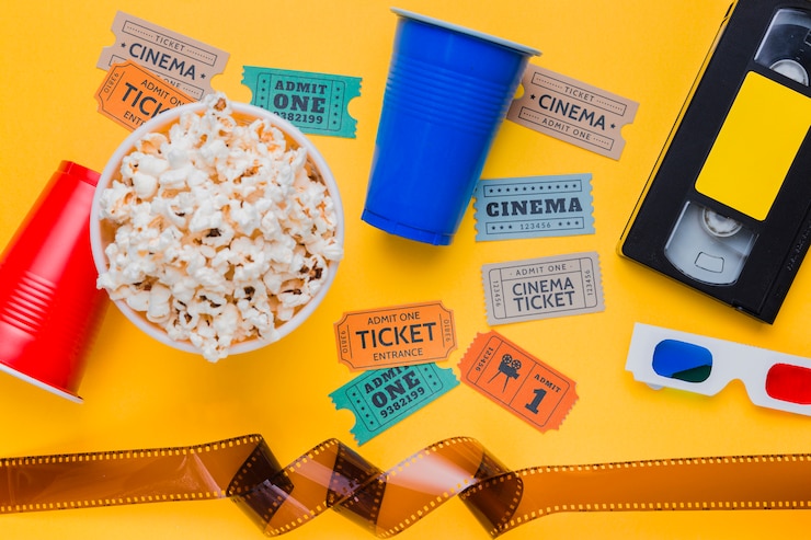 Foto gratuito videotape con biglietti di celluloide e cinema