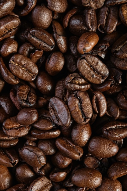 Vista dall'alto della consistenza del caffè tostato pronto Scena di chicchi di caffè Caffè macinato nero