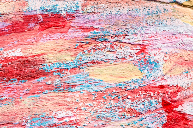 Foto gratuito vista dall'alto di pennellate di vernice colorata sulla superficie