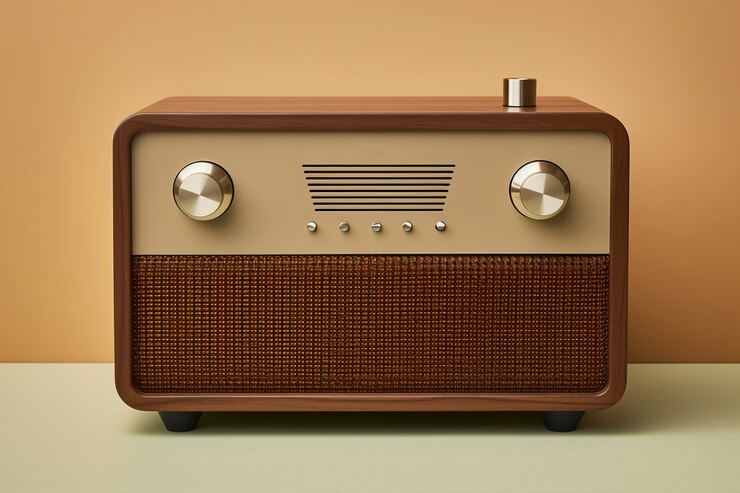 Foto gratuito vista di un dispositivo radio vintage in tonalità di noce