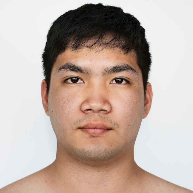 Foto gratuito worldface-ragazzo tailandese in uno sfondo bianco