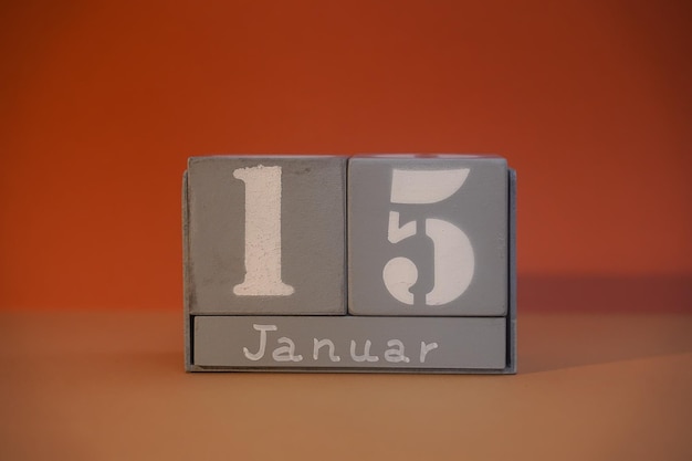 15 gennaio su cubi grigi di legno Data del cubo del calendario 15 gennaio Concetto di data Copia spazio per testo o evento Cubi educativi Calendario a forma di cubo per il 15 gennaio con spazio vuoto Messa a fuoco selettiva