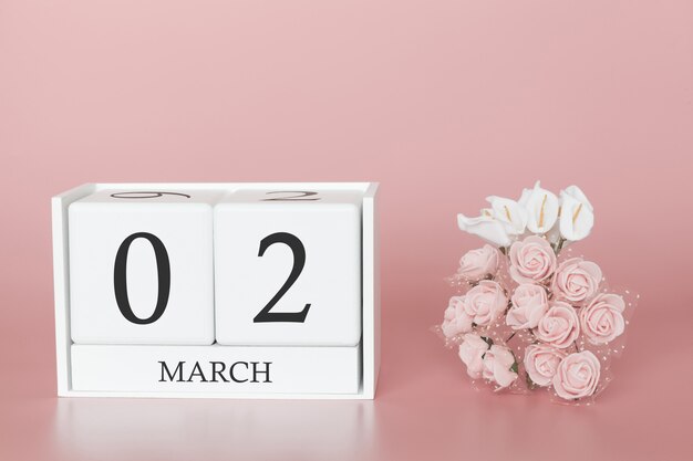 2 marzo. 2 ° giorno del mese Cubo del calendario sul rosa moderno